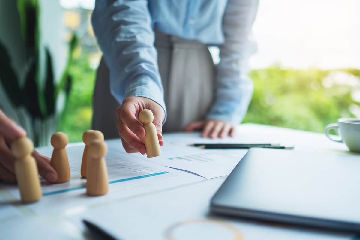 business-strategy-with-wood-figures-and-data